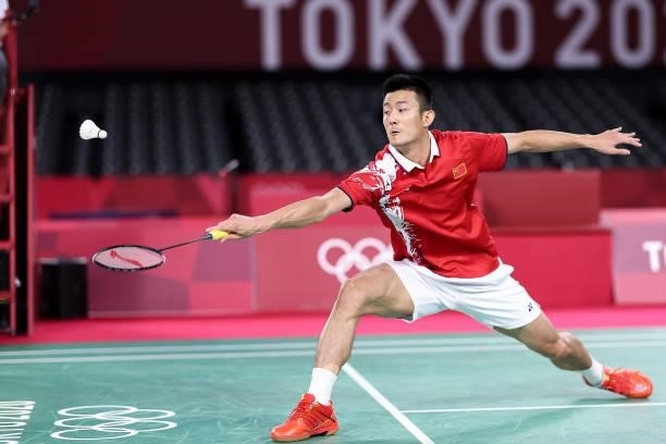Chen Long of Team China competes against Chou Tien-chen of Team Chinese Taipei during a Men's Singles Quarterfinal match on day eight of the Tokyo...