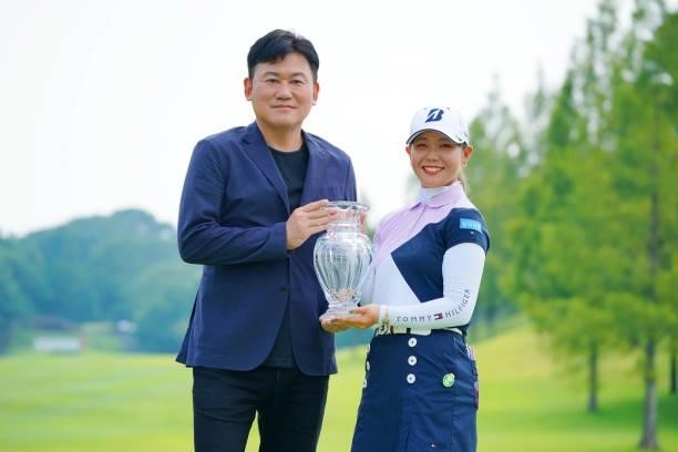 Yuri Yoshida of Japan poses with Rakuten CEO and Chairman Hiroshi Mikitani after the final round of Rakuten Super Ladies at Tokyu Grand Oak Golf Club...