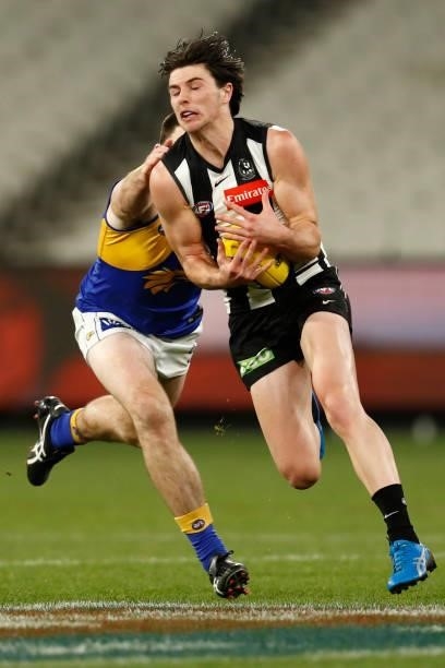 Oliver Henry of the Magpies marks the ball during the round 20 AFL match between Collingwood Magpies and West Coast Eagles at Melbourne Cricket...