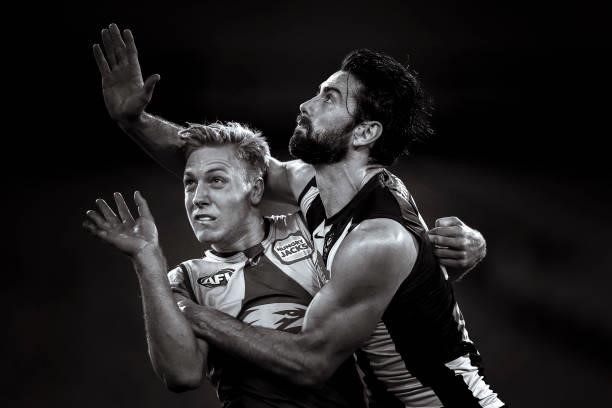 Oscar Allen of the Eagles and Brodie Grundy of the Magpies compete during the round 20 AFL match between Collingwood Magpies and West Coast Eagles at...
