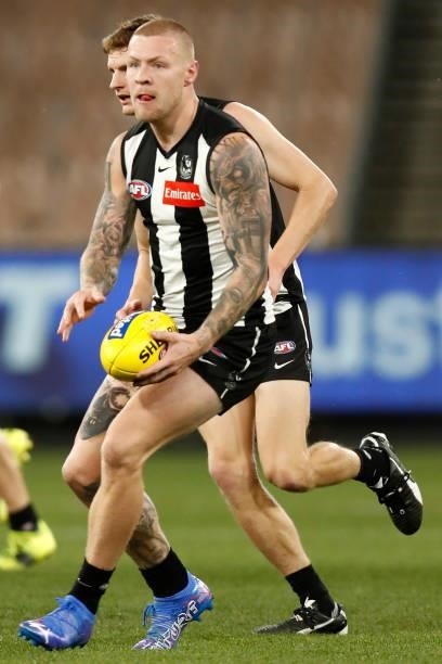 Jordan De Goey of the Magpies runs with the ball during the round 20 AFL match between Collingwood Magpies and West Coast Eagles at Melbourne Cricket...