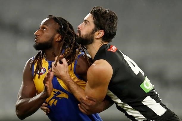 Nic Naitanui of the Eagles and Brodie Grundy of the Magpies compete during the round 20 AFL match between Collingwood Magpies and West Coast Eagles...