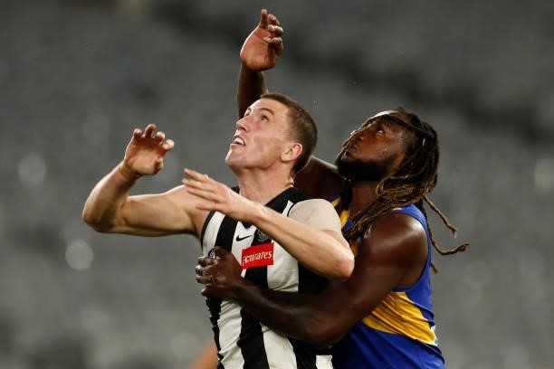 Darcy Cameron of the Magpies and Nic Naitanui of the Eagles compete during the round 20 AFL match between Collingwood Magpies and West Coast Eagles...
