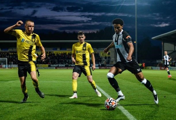 Jamal Lewis of Newcastle United crosses the ball during the Pre Season Friendly between Burton Albion and Newcastle United at the Pirelli Stadium on...