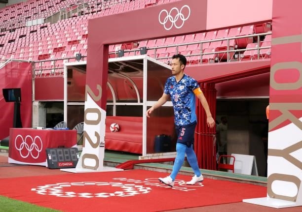 Maya Yoshida of Team Japan leads his side out prior to the Men's Quarter Final match between Japan and New Zealand on day eight of the Tokyo 2020...