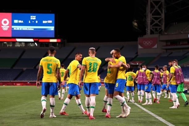 Matheus Cunha of Team Brazil celebrates with team mates after scoring their side's first goal during the Men's Quarter Final between Brazil and Egypt...