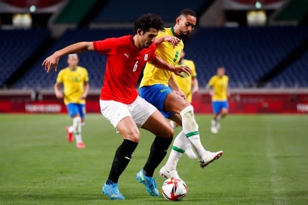 Matheus Cunha of Brazil competes for the ball with Ahmed Hegazy of Egypt in the Men's Quarterfinal match between Brazil and Egypt during the Tokyo...