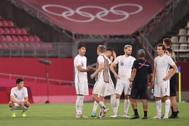 Elijah Just, Dane Ingham, Gianni Stensness and Joe Bell of Team New Zealand look dejected following defeat in the Men's Quarter Final match between...