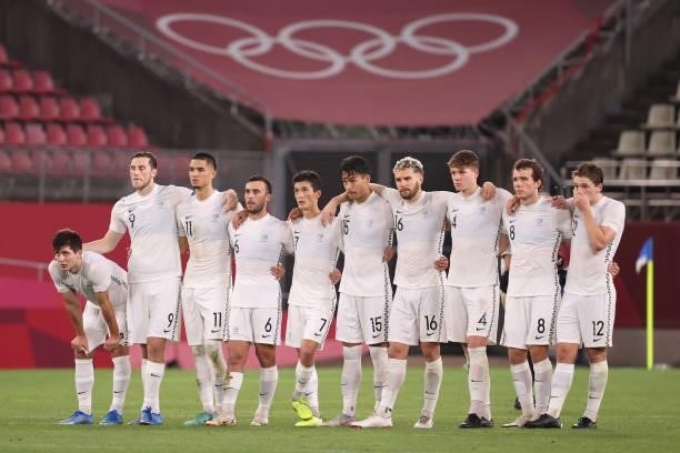 Players of Team New Zealand react during the penalty shoot out during the Men's Quarter Final match between Japan and New Zealand on day eight of the...