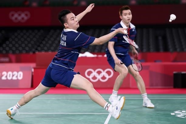 Aaron Chia and Soh Wooi Yik of Team Malaysia compete against Mohammad Ahsan and Hendra Setiawan of Team Indonesia during the Men’s Doubles Bronze...