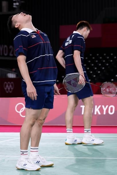Aaron Chia and Soh Wooi Yik of Team Malaysia react as they compete against Mohammad Ahsan and Hendra Setiawan of Team Indonesia during the Men’s...