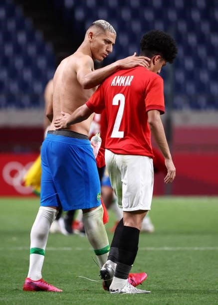 Ammar Hamdy of Team Egypt is consoled by Richarlison of Team Brazil after the Men's Quarter Final between Brazil and Egypt on day eight of the Tokyo...