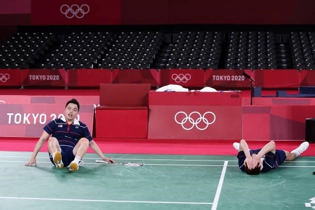 Aaron Chia and Soh Wooi Yik of Team Malaysia celebrate as they win against Mohammad Ahsan and Hendra Setiawan of Team Indonesia during the Men’s...