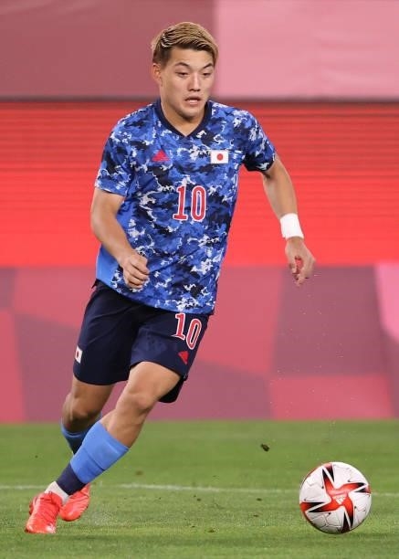 Ritsu Doan of Team Japan runs with the ball during the Men's Quarter Final match between Japan and New Zealand on day eight of the Tokyo 2020 Olympic...