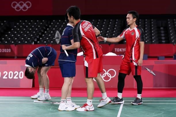 Aaron Chia and Soh Wooi Yik of Team Malaysia greet their opponent Mohammad Ahsan and Hendra Setiawan of Team Indonesia after the Men’s Doubles Bronze...