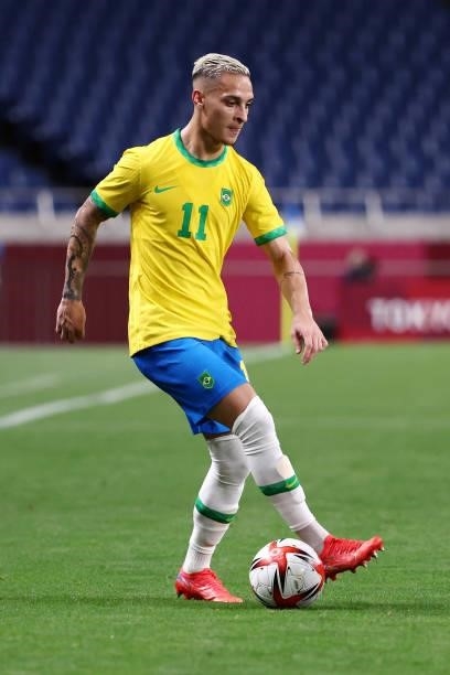 Antony of Team Brazil runs with the ball during the Men's Quarter Final between Brazil and Egypt on day eight of the Tokyo Olympic Games at Saitama...