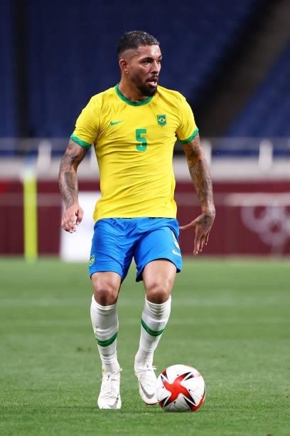 Luiz Douglas of Team Brazil runs with the ball during the Men's Quarter Final between Brazil and Egypt on day eight of the Tokyo Olympic Games at...