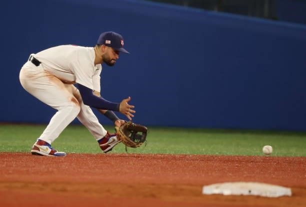 Eduardo Alvarez of Team United States fields in the eighth inning during the baseball opening round Group B game between Team South Korea and Team...