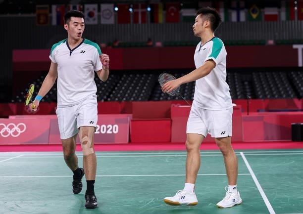 Lee Yang and Wang Chi-Lin of Team Chinese Taipei react as they compete against Li Jun Hui and Liu Yu Chen of Team China during the Men’s Doubles Gold...