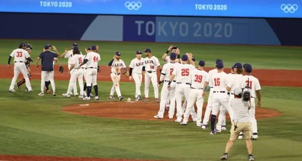 Team United States celebrate winning the match 4-2 during the baseball opening round Group B game between Team South Korea and Team United States on...