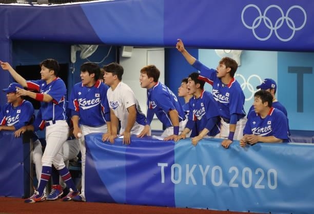 Team South Korea players react during the baseball opening round Group B game between Team South Korea and Team United States on day eight of the...