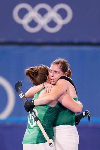 Shirley McCay and Kathryn Mullan of Team Ireland embrace following a loss in the Women's Preliminary Pool A match between Ireland and Great Britain...