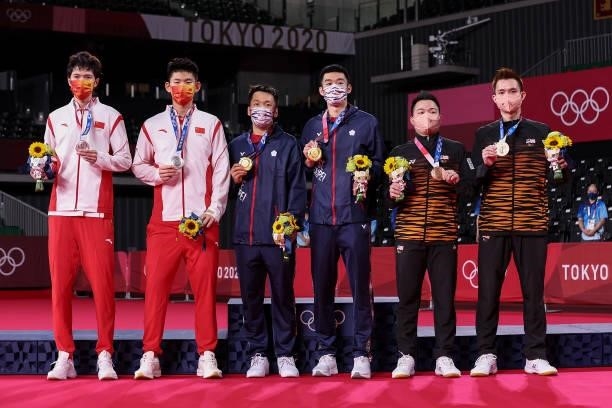 Silver medalists Li Jun Hui and Liu Yu Chen of Team China, gold medalists Lee Yang and Wang Chi-Lin of Team Chinese Taipei and bronze medalists Aaron...