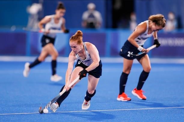 Sarah Louise Jones of Team Great Britain runs with the ball during the Women's Preliminary Pool A match between Ireland and Great Britain on day...