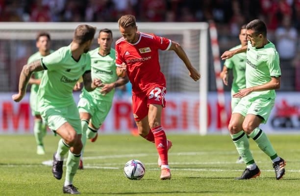 Marcus Ingvartsen of 1.FC Union Berlin is challenged by Dani Vivian of Athletic Bilbao during the pre-season friendly match between 1. FC Union...