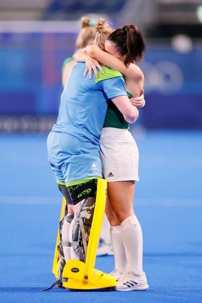 Ayeisha McFerran and Anna O'Flanagan of Team Ireland embrace following a loss in the Women's Preliminary Pool A match between Ireland and Great...