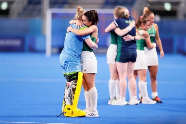 Ayeisha McFerran and Anna O'Flanagan of Team Ireland embrace following a loss in the Women's Preliminary Pool A match between Ireland and Great...
