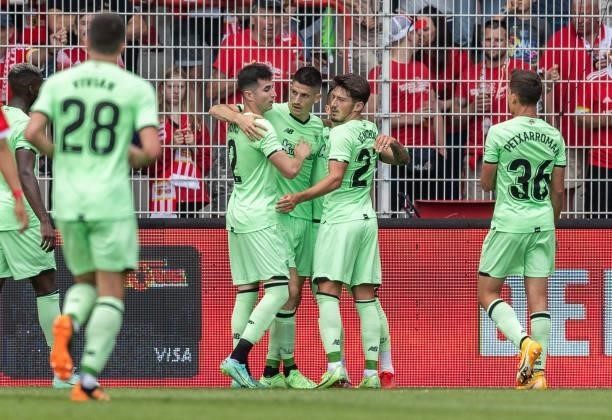 Alex Berenguer of Athletic Bilbao celebrates with teammates after scoring his team's first goal during the pre-season friendly match between 1. FC...