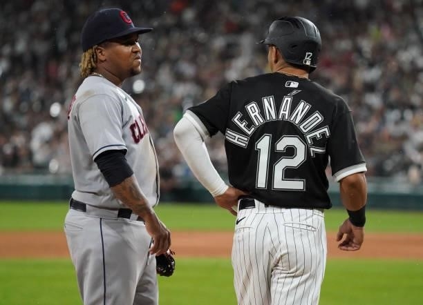 Jose Ramirez of the Cleveland Indians chats with former teammate Cesar Hernandez of the Chicago White Sox during a game at Guaranteed Rate Field on...