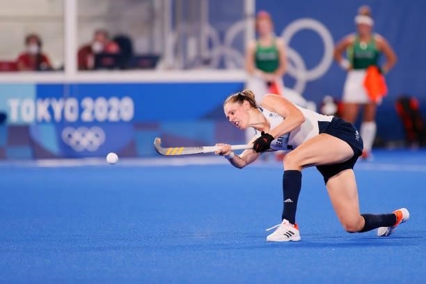 Giselle Ansley of Team Great Britain passes the ball during the Women's Preliminary Pool A match between Ireland and Great Britain on day eight of...