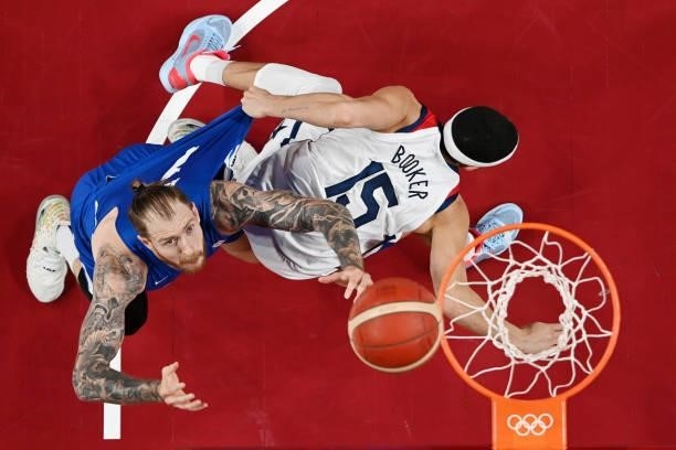 Patrik Auda of Team Czech Republic goes up for a rebound over Devin Booker of Team United States during the second half of a Men's Basketball...