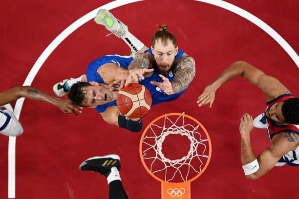 Jan Vesely and Patrik Auda of Team Czech Republic go up for a rebound against the Jayson Tatum of Team United States during the second half of a...