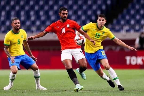 Ahmed Rayan of Egypt competes for the ball with Nino of Brazil in the Men's Quarterfinal match between Brazil and Egypt during the Tokyo 2020 Olympic...