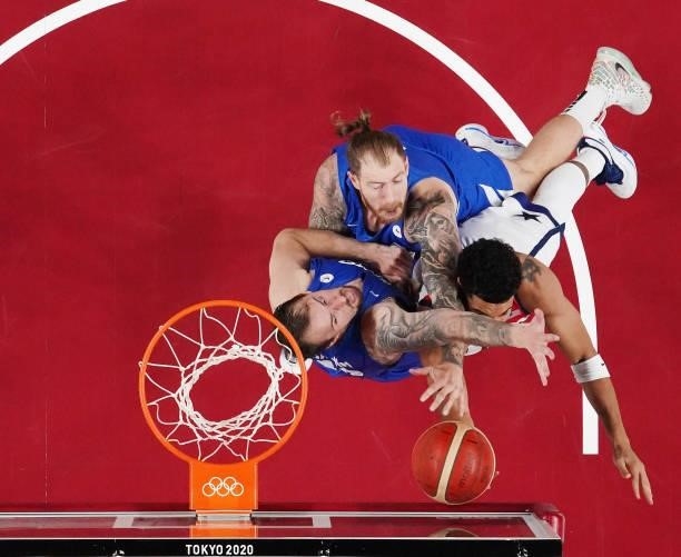 Jayson Tatum of Team United States drives to the basket against Patrik Auda and Ondrej Balvin of Team Czech Republic during the second half of a...