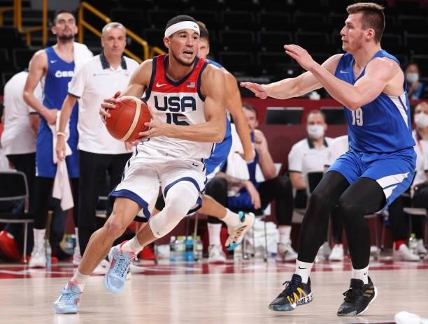 Devin Booker of Team United States drives to the basket against Ondrej Sehnal of Team Czech Republic during the second half of a Men's Basketball...
