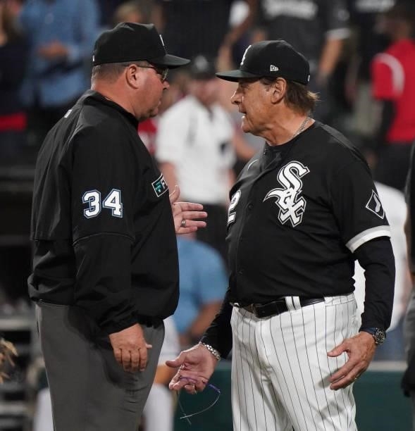 Manager Tony La Russa of the Chicago White Sox speaks with umpire Sam Holbrook during a game against the Cleveland Indians at Guaranteed Rate Field...