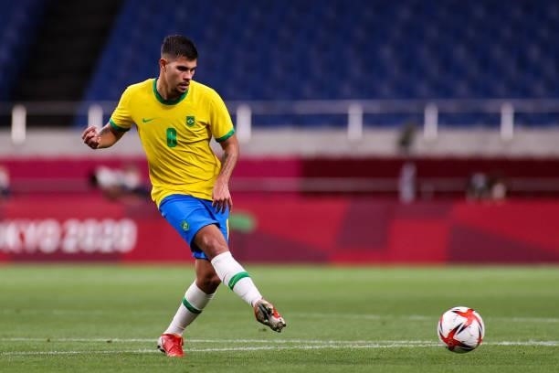 Bruno Guimaraes of Brazil pass the ball in the Men's Quarterfinal match between Brazil and Egypt during the Tokyo 2020 Olympic Games at Saitama...