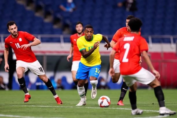Malcom of Brazil competes for the ball in the Men's Quarterfinal match between Brazil and Egypt during the Tokyo 2020 Olympic Games at Saitama...