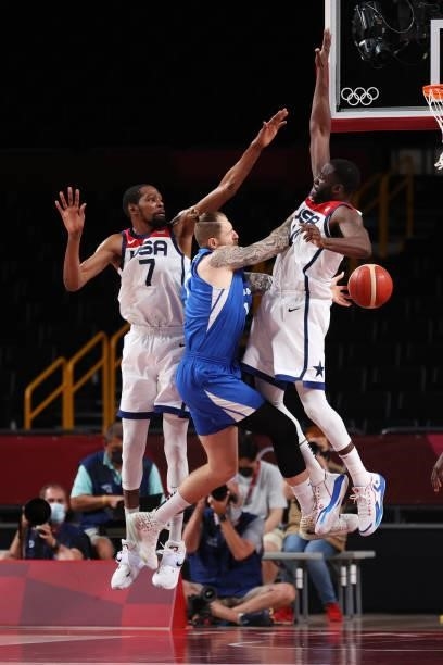 Patrik Auda of Team Czech Republic drives to the basket against Kevin Durant and Draymond Green of Team United States during the second half of a...