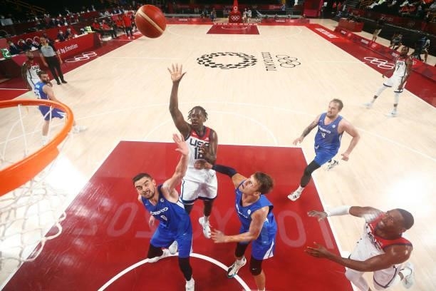 Jrue Holiday of Team United States shoots over Tomas Satoransky and Jan Vesely of Team Czech Republic during the second half of a Men's Basketball...