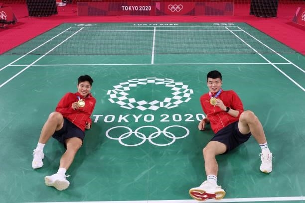 Gold medalists of Mix Doubles badminton event Wang Yi Lyu and Huang Dong Ping of Team China pose for photo on day eight of the Tokyo 2020 Olympic...
