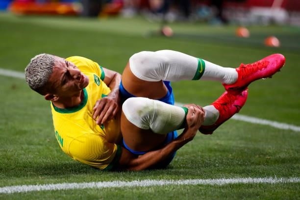 Richarlison of Brazil injured in the Men's Quarterfinal match between Brazil and Egypt during the Tokyo 2020 Olympic Games at Saitama Stadium on July...