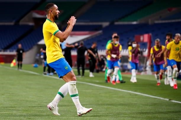 Matheus Cunha of Brazil celebrates his scoring with teammates in the Men's Quarterfinal match between Brazil and Egypt during the Tokyo 2020 Olympic...