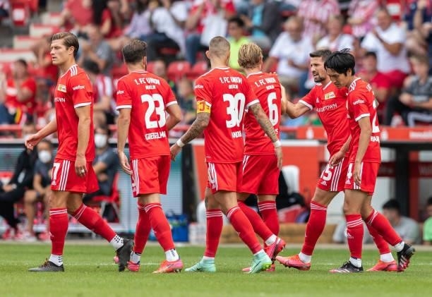 Genki Haraguchi of 1.FC Union Berlin celebrates with teammates after scoring his team's first goal during the pre-season friendly match between 1. FC...