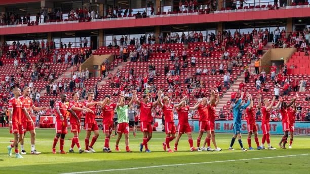 Players of Union celebrate with their fans after winning the pre-season friendly match between 1. FC Union Berlin and Athletic Bilbao at Stadion An...