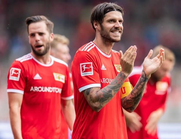 Christopher Trimmel of 1.FC Union Berlin celebrates with his fans after winning the pre-season friendly match between 1. FC Union Berlin and Athletic...